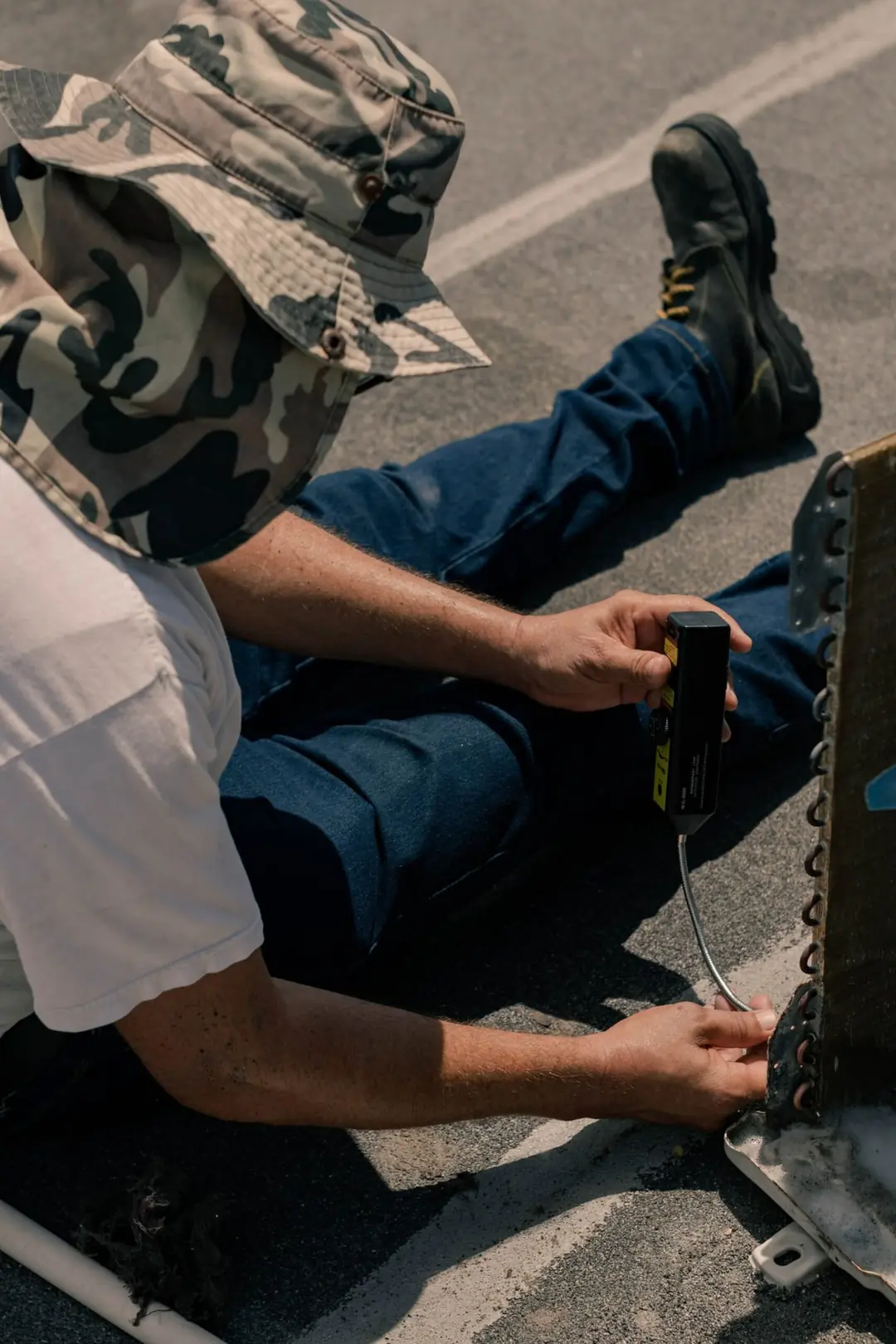 Engineer testing a commercial air conditioning coil
